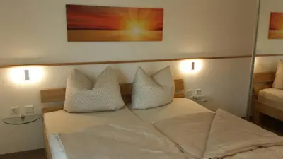 Ein Bett oder Betten in einem Zimmer der Unterkunft Spreeparadies-Semisch