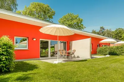 Ein Garten an der Unterkunft Bungis - 28 Ferienhäuser Am Grimnitzsee G1