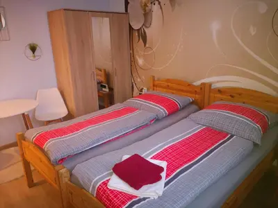 Ein Bett oder Betten in einem Zimmer der Unterkunft Ferienwohnung Dickes