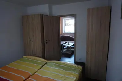 Ein Bett oder Betten in einem Zimmer der Unterkunft Fewo-Sossna