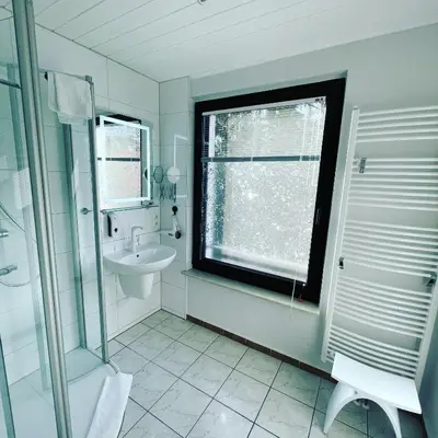 Ein Badezimmer in der Unterkunft Appartement Seebadallee mit Wallbox für e-Autos