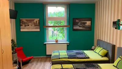 Ein Bett oder Betten in einem Zimmer der Unterkunft YourHome-PM