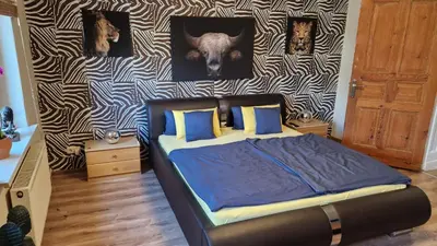 Ein Bett oder Betten in einem Zimmer der Unterkunft YourHome-PM