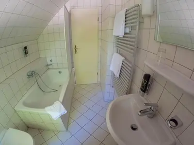 Ein Badezimmer in der Unterkunft Hotel Diana