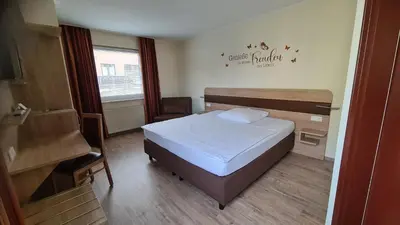 Ein Bett oder Betten in einem Zimmer der Unterkunft KomfortHotel Grossbeeren - Stadt-Gut-Hotel