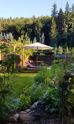 Ein Garten an der Unterkunft Ferienwohnung Papenmühle am Kurpark
