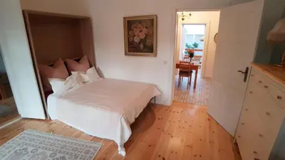 Ein Bett oder Betten in einem Zimmer der Unterkunft Ferienwohnung Papenmühle am Kurpark