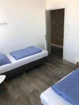 Ein Bett oder Betten in einem Zimmer der Unterkunft Trafohaus