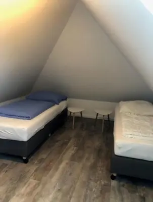 Ein Bett oder Betten in einem Zimmer der Unterkunft Trafohaus