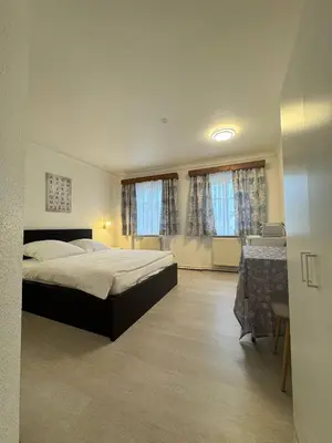 Ein Bett oder Betten in einem Zimmer der Unterkunft Landhotel Waldschänke