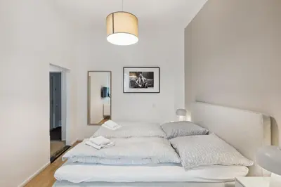 Ein Bett oder Betten in einem Zimmer der Unterkunft Arbio I 1A Rooms & Apartments Prenzlauerberg Berlin