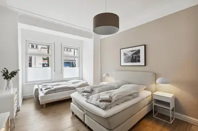 Ein Bett oder Betten in einem Zimmer der Unterkunft Arbio I 1A Rooms & Apartments Prenzlauerberg Berlin