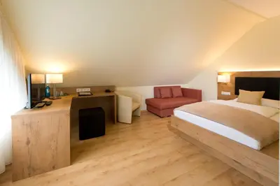 Ein Bett oder Betten in einem Zimmer der Unterkunft Spreewaldhotel Stephanshof