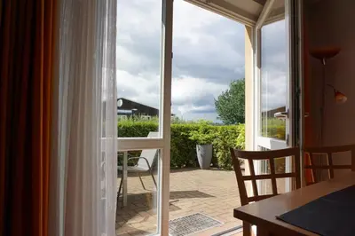 Ein Balkon oder eine Terrasse in der Unterkunft Maisonetten Apartment
