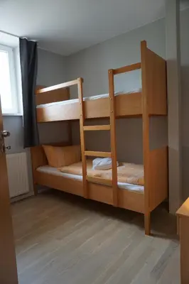 Ein Bett oder Betten in einem Zimmer der Unterkunft Maisonetten Apartment