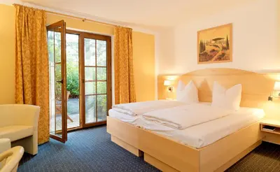 Ein Bett oder Betten in einem Zimmer der Unterkunft Hotel am Katharinenholz