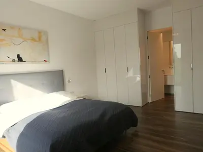 Ein Bett oder Betten in einem Zimmer der Unterkunft B! Apartments
