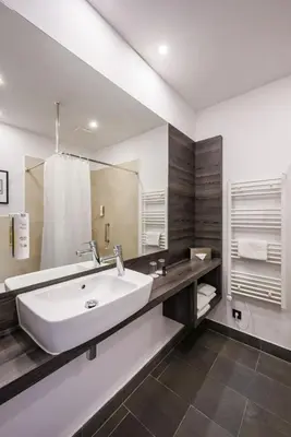 Ein Badezimmer in der Unterkunft Airporthotel Berlin-Adlershof