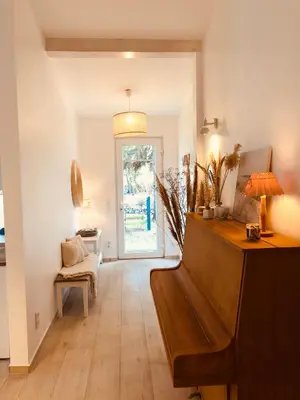 Ein Sitzbereich in der Unterkunft GartenLoft mit Outdoor Whirlpool und Garten