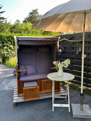 Ein Garten an der Unterkunft GartenLoft mit Outdoor Whirlpool und Garten