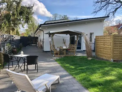 Ein Garten an der Unterkunft GartenLoft mit Outdoor Whirlpool und Garten