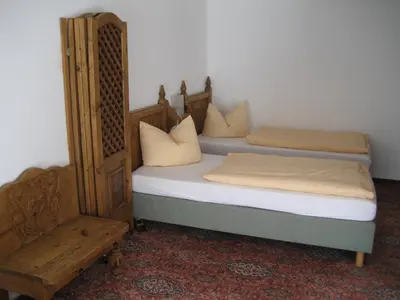 Ein Bett oder Betten in einem Zimmer der Unterkunft Solitaire Hotel