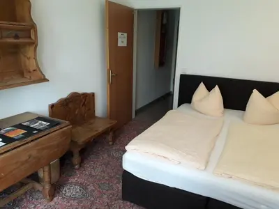 Ein Bett oder Betten in einem Zimmer der Unterkunft Solitaire Hotel