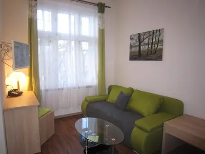 Ein Sitzbereich in der Unterkunft Gast-& Logierhaus Am Rheinsberger See