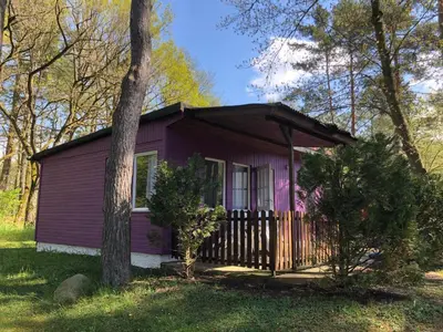 Ein Garten an der Unterkunft Gast-& Logierhaus Am Rheinsberger See