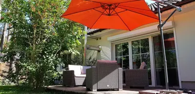 Ein Garten an der Unterkunft Ferienhaus Fichtenwalde, 160qm, 3SZ, 2BD, Küche, VDSL