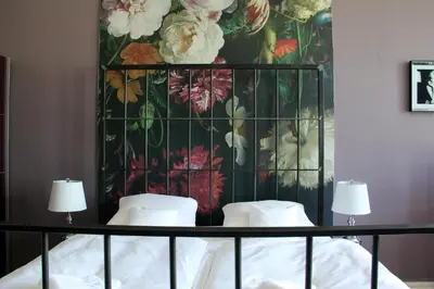 Ein Bett oder Betten in einem Zimmer der Unterkunft ArtHotel Connection
