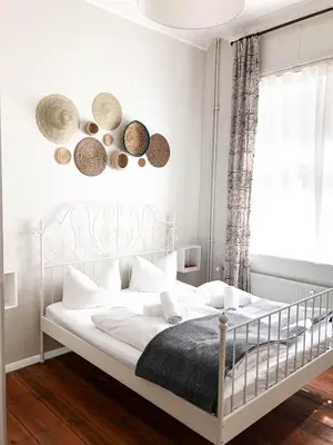 Ein Bett oder Betten in einem Zimmer der Unterkunft Pension Absolut Berlin