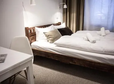 Ein Bett oder Betten in einem Zimmer der Unterkunft Pension Absolut Berlin