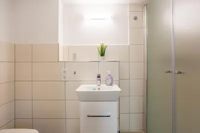 Ein Badezimmer in der Unterkunft Gästezimmer Teltow