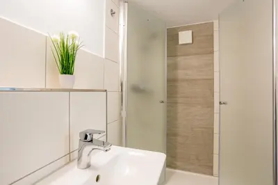 Ein Badezimmer in der Unterkunft Gästezimmer Teltow