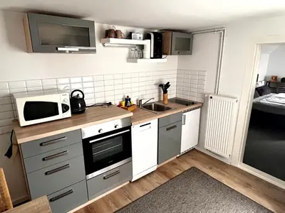 Küche/Küchenzeile in der Unterkunft Gästezimmer Teltow