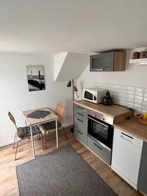 Küche/Küchenzeile in der Unterkunft Gästezimmer Teltow