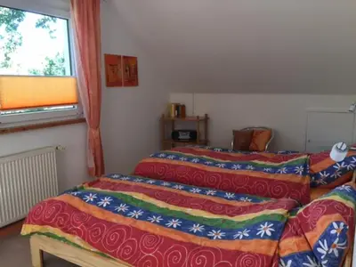 Ein Bett oder Betten in einem Zimmer der Unterkunft Ferienwohnung Sonnengelb