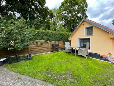 Ein Garten an der Unterkunft Tiny House