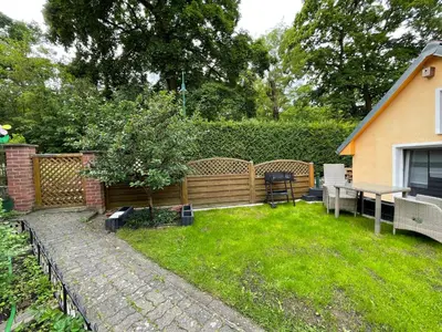 Ein Garten an der Unterkunft Tiny House