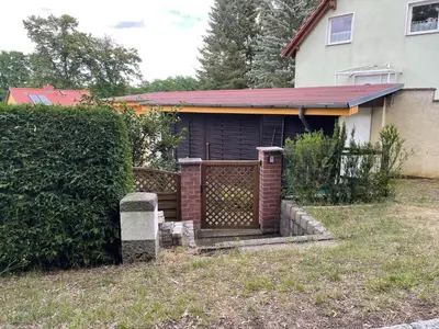 Ein Garten an der Unterkunft Tiny House