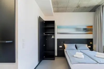Ein Bett oder Betten in einem Zimmer der Unterkunft Nena Apartments Moritzplatz