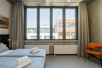Ein Bett oder Betten in einem Zimmer der Unterkunft Nena Apartments Moritzplatz