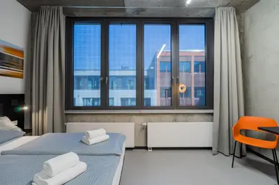 Ein Bett oder Betten in einem Zimmer der Unterkunft Nena Apartments Moritzplatz