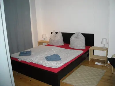 Ein Bett oder Betten in einem Zimmer der Unterkunft Pension Mitte