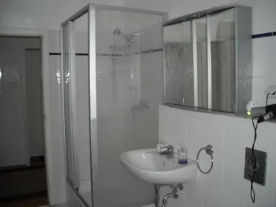 Ein Badezimmer in der Unterkunft Pension Mitte