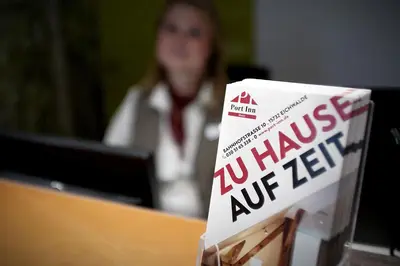 Ein Zertifikat, Auszeichnung, Logo oder anderes Dokument, das in der Unterkunft Port Inn Hotel ausgestellt ist