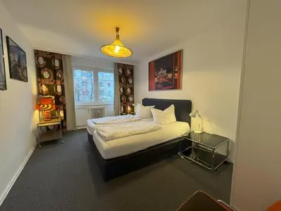Ein Bett oder Betten in einem Zimmer der Unterkunft M M Central Apartments - Free Parking - Vintage Style