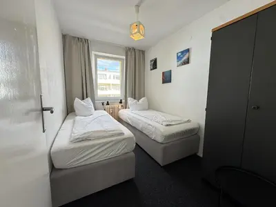 Ein Bett oder Betten in einem Zimmer der Unterkunft M M Central Apartments - Free Parking - Vintage Style
