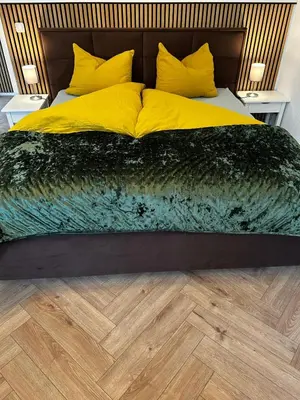 Ein Bett oder Betten in einem Zimmer der Unterkunft Carl-Schmäcke-Straße 7